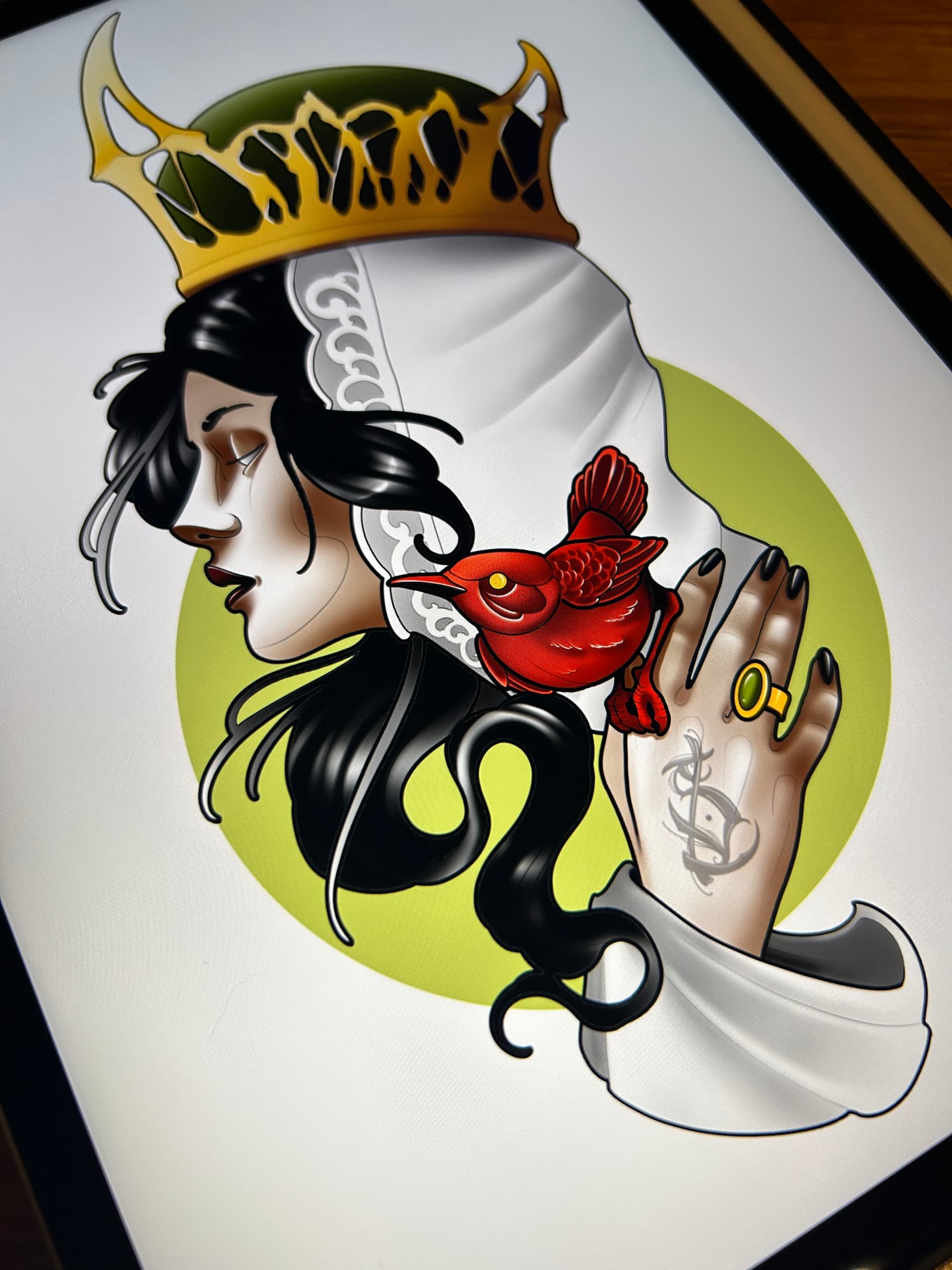 Neo traditional tattoo design of a woman in a crown with a red bird on her hand