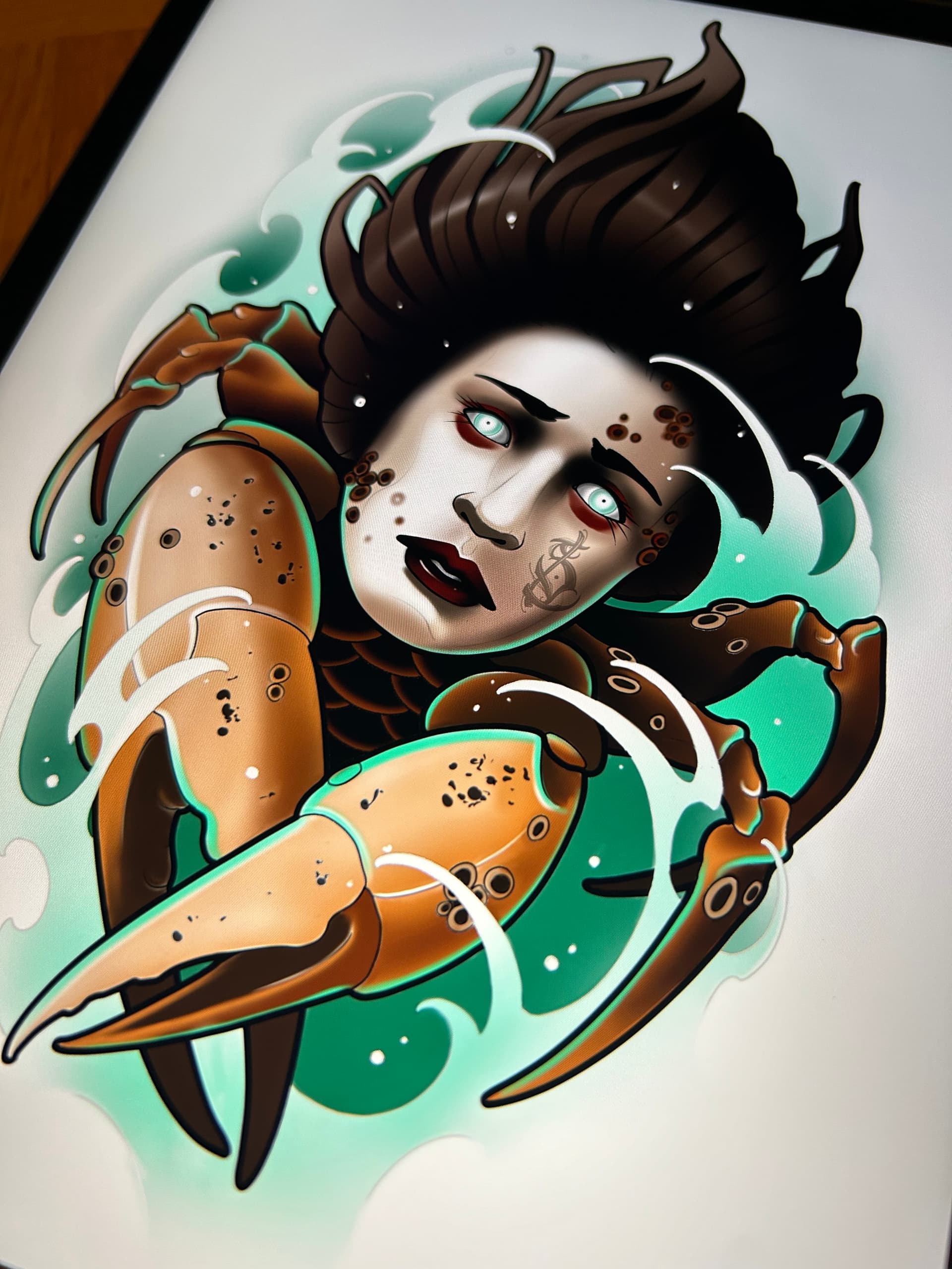 Neo traditional tattoo design of a woman with crab claws emerging from turquoise water